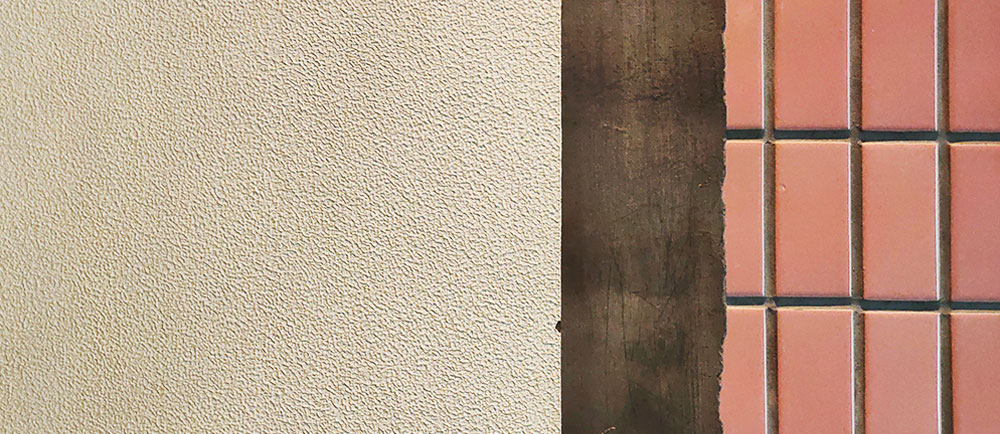 亚士纸皮石在瓷砖墙面上施工